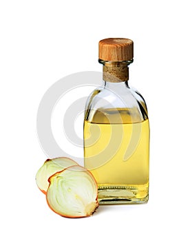 Glass bottle of onion syrup and fresh ingredient