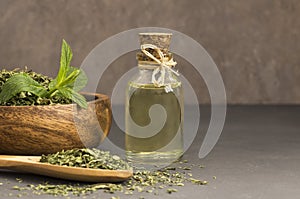 Glass bottle of peppermint essential oil