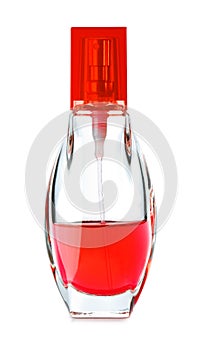 Glass bottle of red perfume