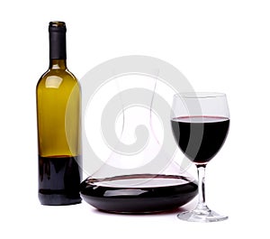 Glass and bottle of red wine decanter