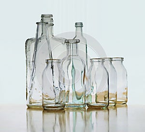 Glass bottle refraction, reflection floating on horizon