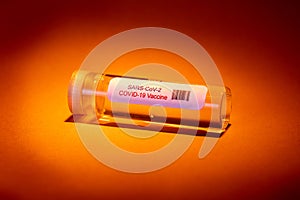 Glass Bottle with Sars-Covid-19 Vaccine Label Attached-Covid-19 Vaccine Label Attached