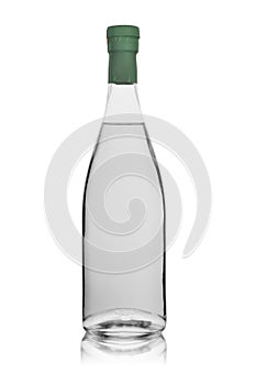 Glass bottle with transparent colourless alcoholic drink sealed. Isolated on a white background with reflection