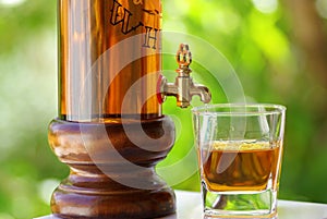 Glass and bottle of whisky