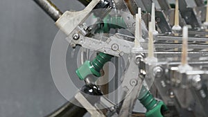 Glass bottles on the automatic conveyor line at the champagne or wine factory. Plant for bottling alcoholic beverages.