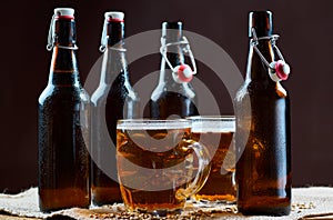 Glass and bottles of beer