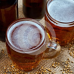 Glass and bottles of beer