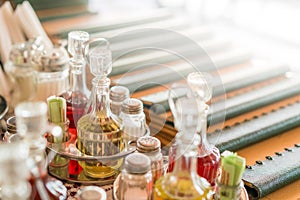 Glass bottles containing oil, vinegar, salt and pepper