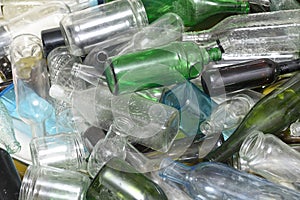 Glass bottles inside a glass recycling