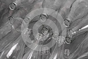 Glass bottles inside a glass recycling container