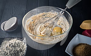 Glass bowl with flour and egg yolks