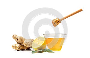 Glass bowl with honey, ginger and lemon for sore throat on white background