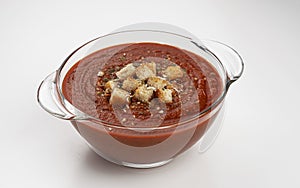 Glass bowl of tomato cream soup