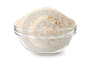 Glass bowl of uncooked dry rice photo
