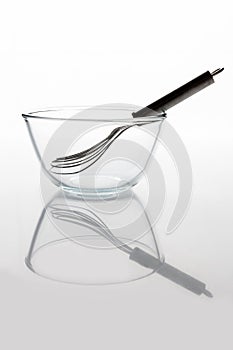 Glass bowl with whisker inside side view with reflection vertical