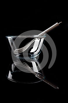 Glass bowl with whisker inside side view with reflection vertical