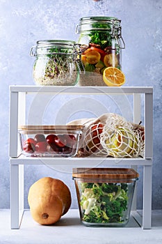 Glass boxes and cans with fresh food refrigerator storage concept decanting