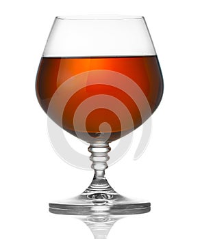 Glass of brandy on white