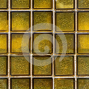 Glass brick tile texture yellow mosaic of wall squares background