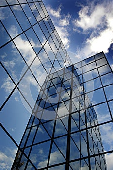 Glass Building for Business Reflection of Blue Sky and Clouds