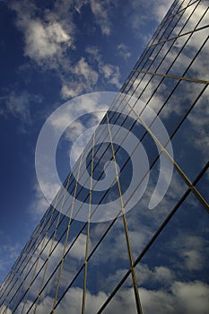 Glass Building for Business Reflection of Blue Sky and Clouds