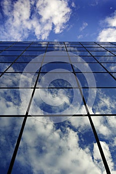 Glass Building for Business Reflection of Blue Sky and Clouds