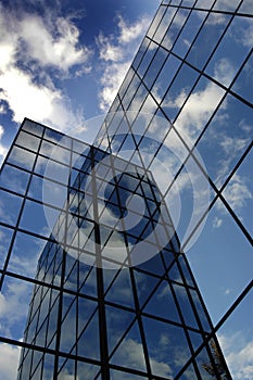 Glass Building for Business Reflection of Blue Sky and Clouds