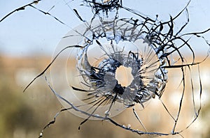 Glass bullet hole background snapshot