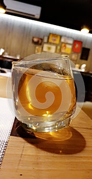 A glass of buzzy wisky