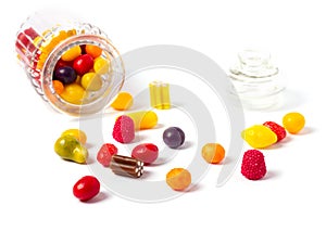 Glass candy jar filled with colorful candies.
