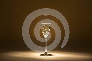 Glass of cava in the dark, flavors in privacy