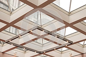Glass ceiling of the hall with illumination.