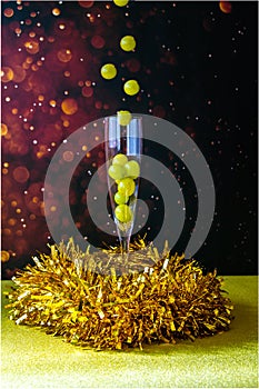 A glass of champagne with several lucky grapes levitating.