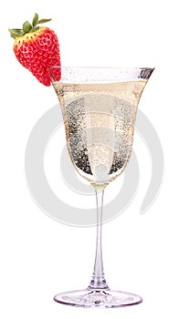 Glass of champagne with tasty strawberry