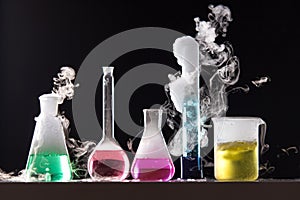 Glass in a chemical laboratory filled with colored liquid during