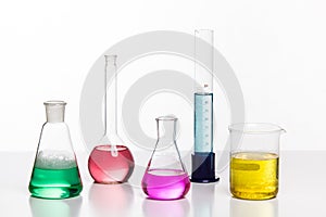 Glass in a chemical laboratory filled with colored liquid during