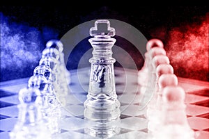 Glass chess pieces on a glass chessboard