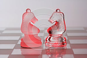 Glass chessmen in red light