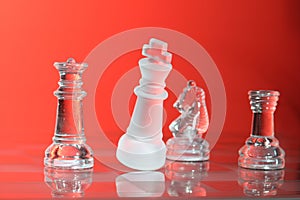 Glass chessmen in red light