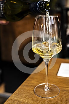 Glass of Chilean Chardonnay Viognier white wine served in restaurant