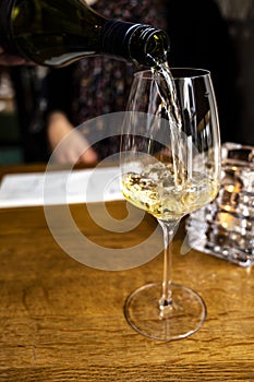 Glass of Chilean Chardonnay Viognier white wine served in restaurant