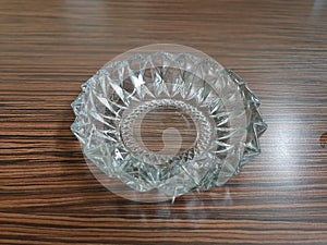 glass cigarette ashtray on the table