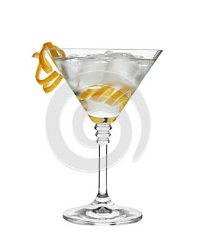 Glass of classic martini cocktail with ice cubes and lemon zest
