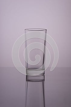 glass of clean water on a gray white background
