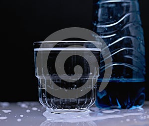 Glass of clear drinking water on a table no people stock photo