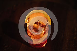 Glass of cocktail with Aperol Sprizz on table