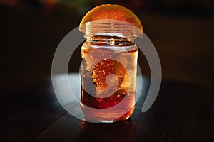 Glass of cocktail with Aperol Sprizz on table