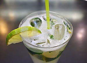 Glass of cocktail on bar