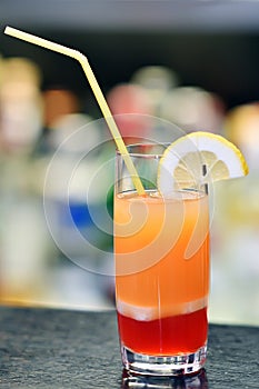 Glass of cocktail on bar