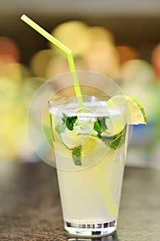 Glass of cocktail on bar